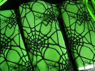 green and black spider web skirt