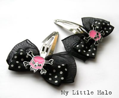 pink skull and crossbones hair bow clips