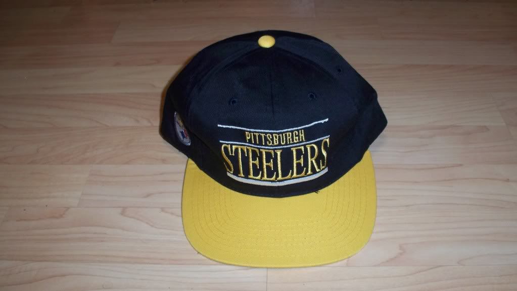 The Black And Yellow Pittsburgh Steelers NFL Vintage Pom Beanie Hat By